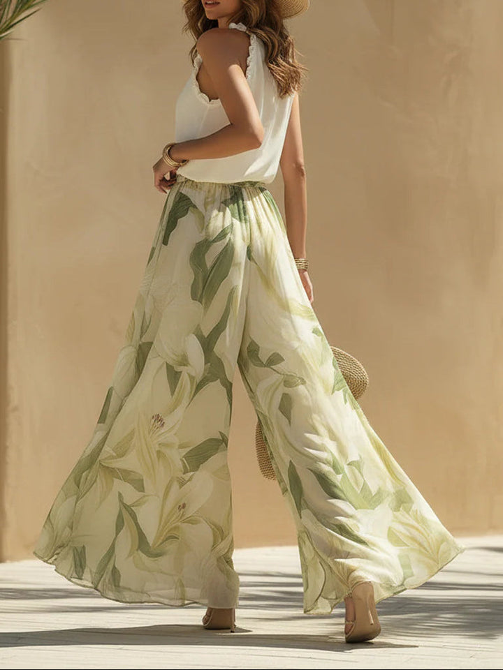 Alessandra - Haut sans manches en chiffon avec volants et pantalon imprimé de lys
