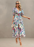 ASTELLA | ROBE MIDI FLORALE FLATTEUSE
