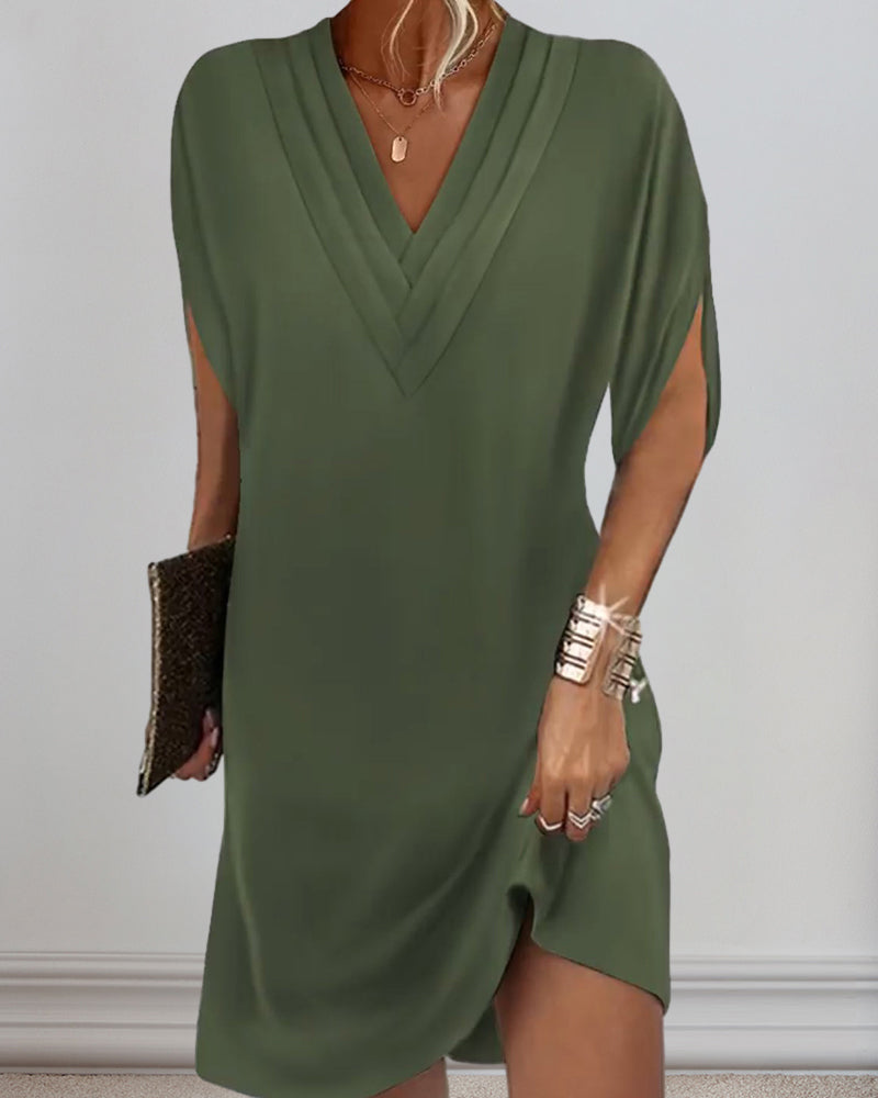 Robe élégante à manches fendues de couleur unie
