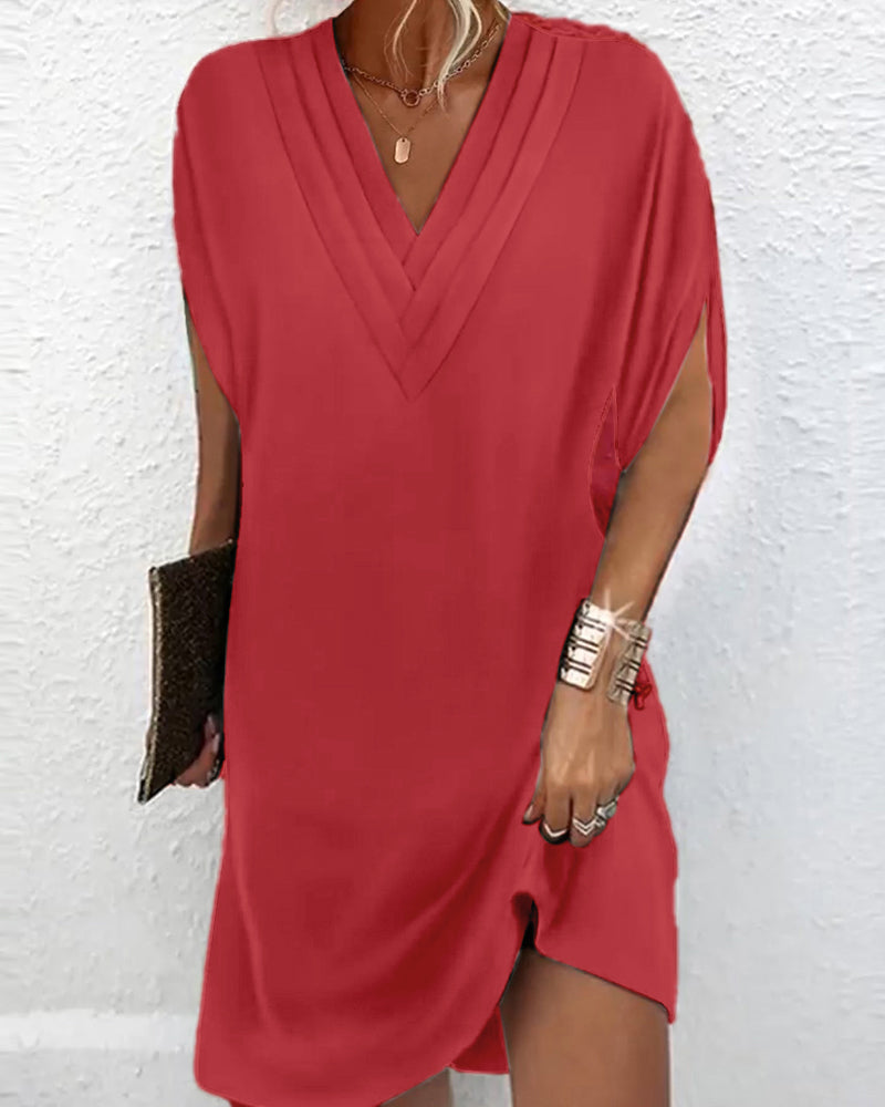 Robe élégante à manches fendues de couleur unie