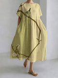 Robe décontractée à col rond avec une pie perchée sur une branche d'arbre dans le style japonais