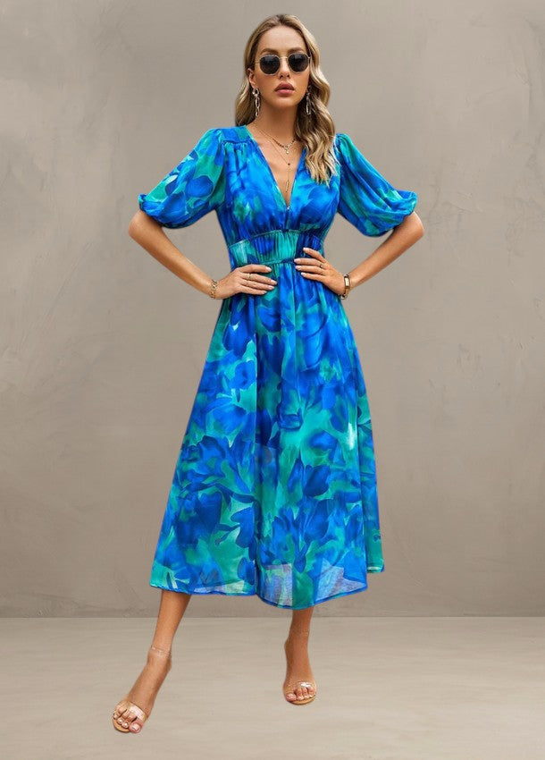ASTELLA | ROBE MIDI FLORALE FLATTEUSE