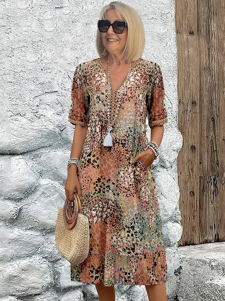 Susan | Robe Midi Imprimé Floral Sauvage Col V & Manches Courtes