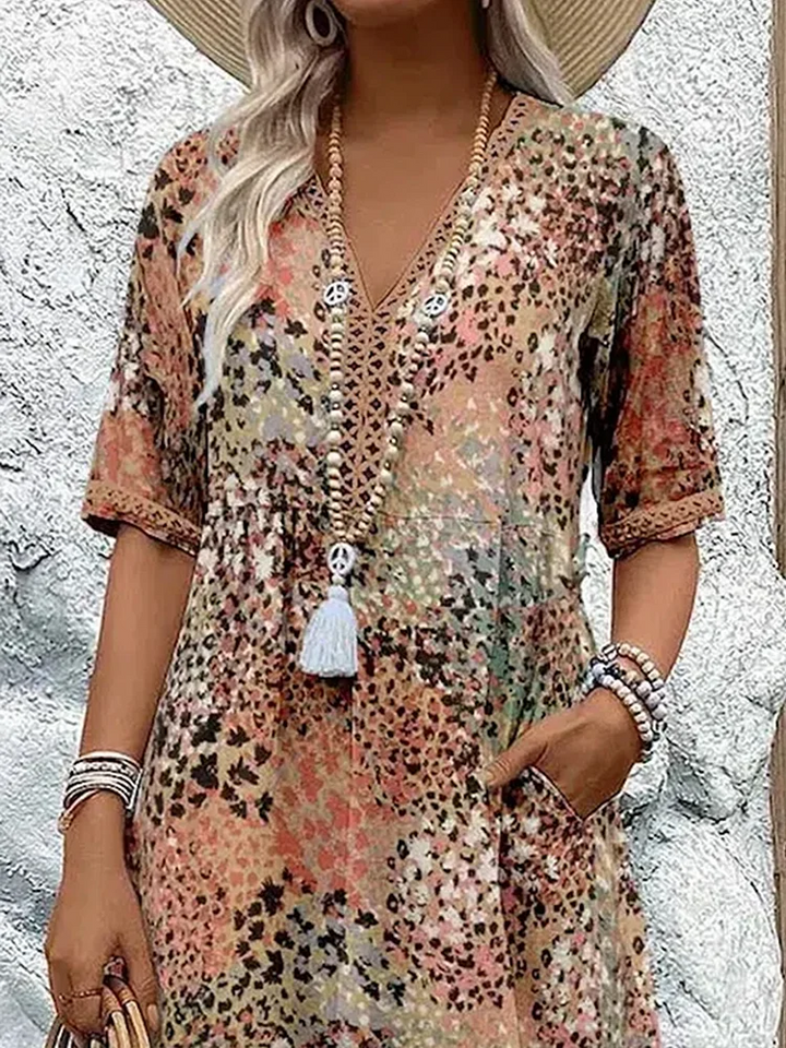 Susan | Robe Midi Imprimé Floral Sauvage Col V & Manches Courtes