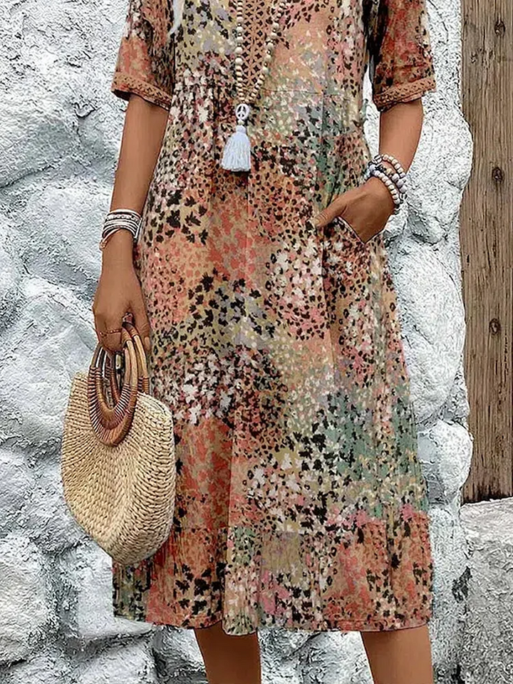 Susan | Robe Midi Imprimé Floral Sauvage Col V & Manches Courtes
