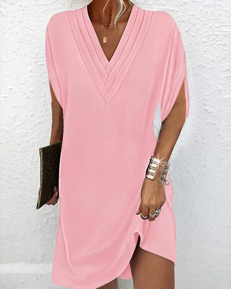 Robe élégante à manches fendues de couleur unie